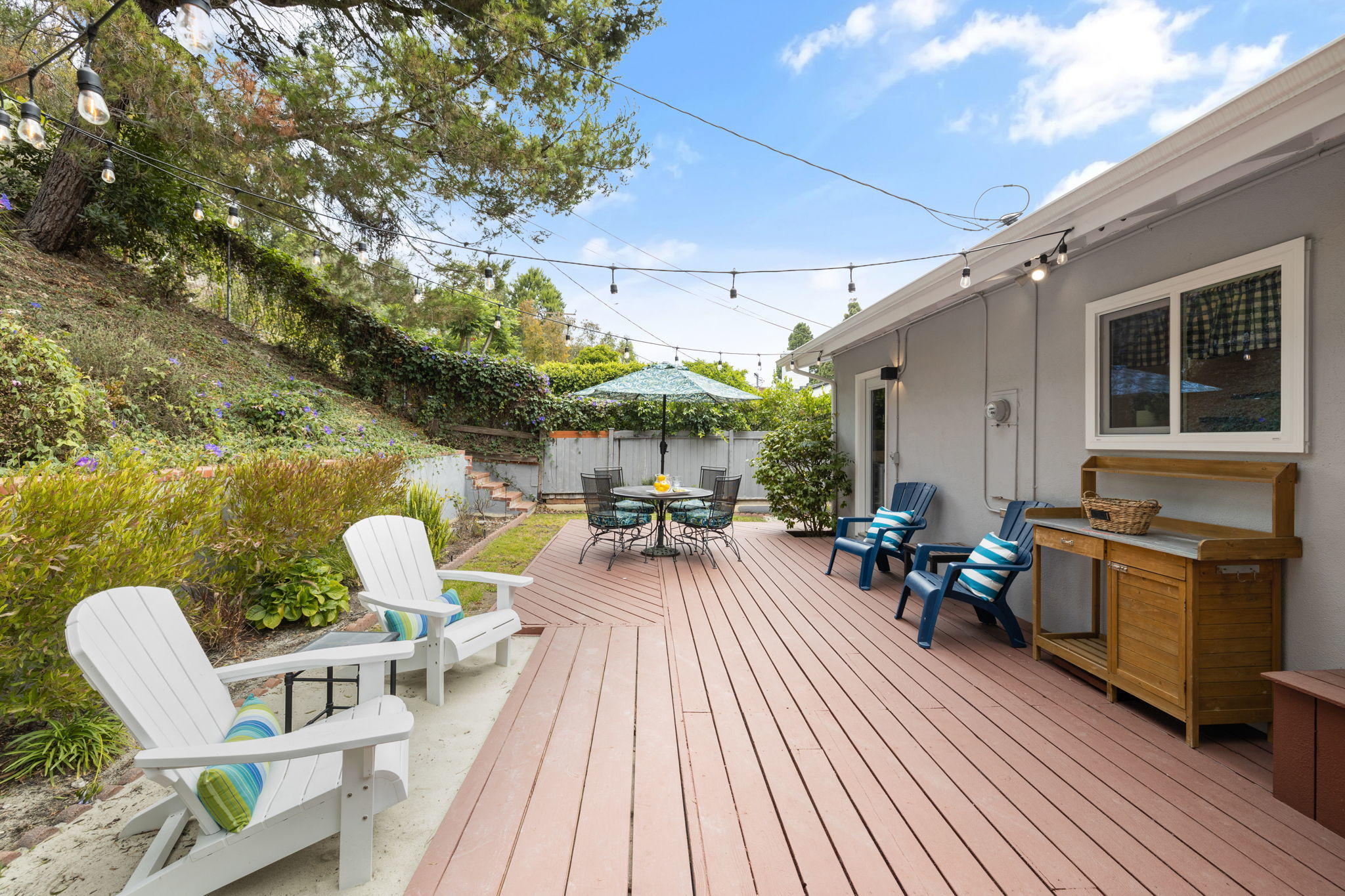 5853 Flambeau Road Rancho Palos Verdes, CA 90275 - Photo 27 of 32 a view of a chairs and table in patio with wooden floor