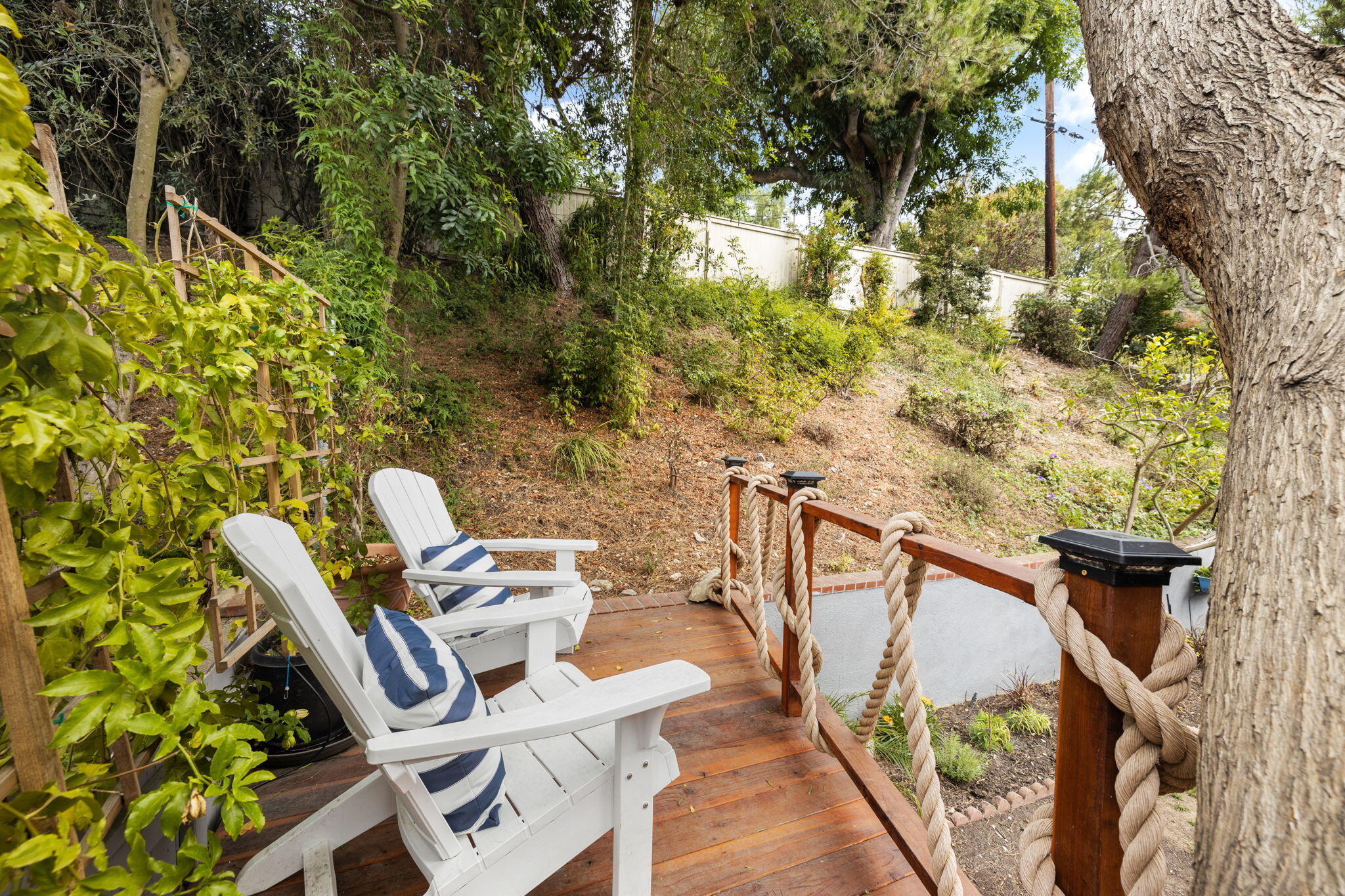 5853 Flambeau Road Rancho Palos Verdes, CA 90275 - Photo 30 of 32 a view of a balcony with chairs