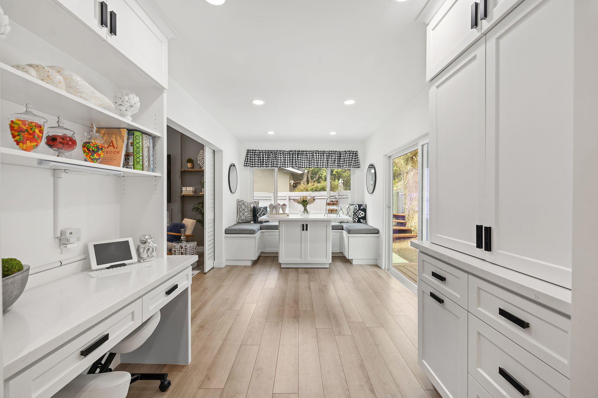 5853 Flambeau Road Rancho Palos Verdes, CA 90275 - Photo 9 of 32 a kitchen with white cabinets and white appliances