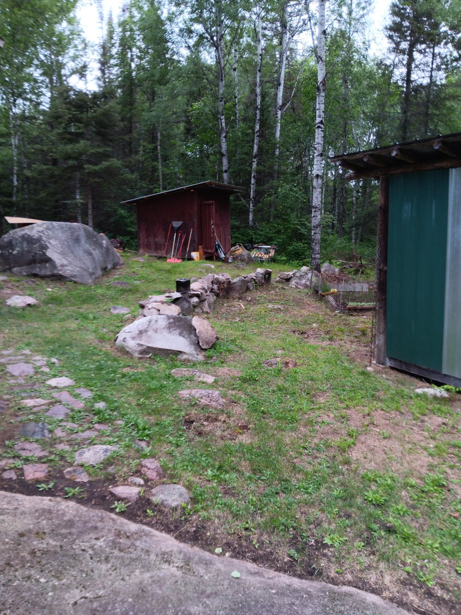 4002 Shilo Trail Ely, MN 55731 - Photo 3 of 15 View of yard featuring a storage shed