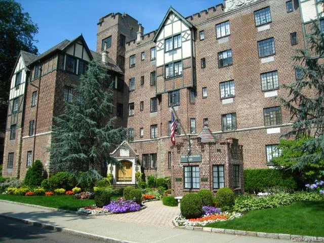 a front view of a multi story residential apartment building