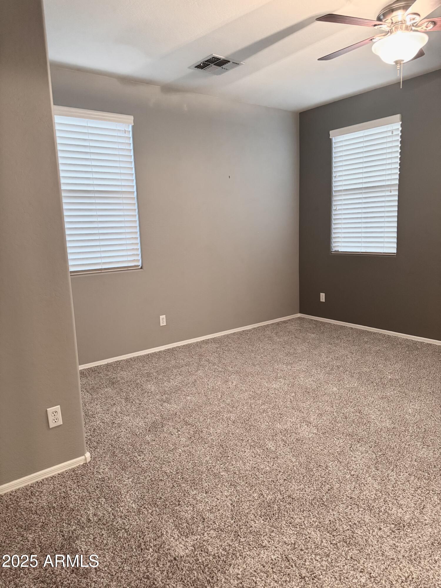 8130 West Groom Creek Road Phoenix, AZ 85043 - Photo 12 of 16 a view of an empty room with a window