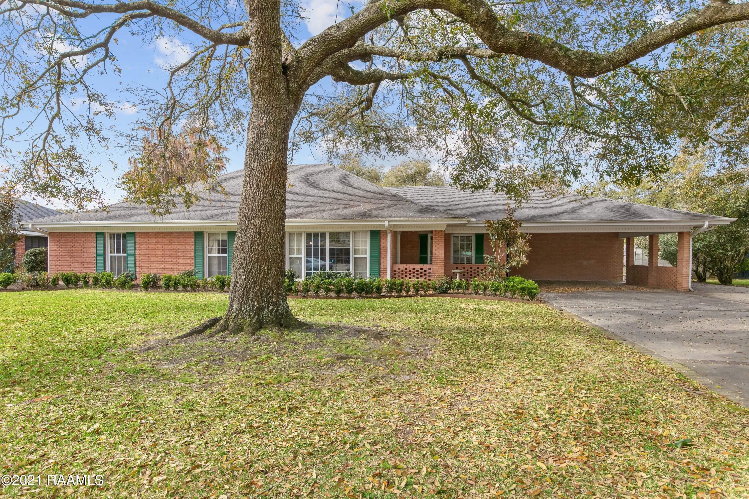 1102 Greenbriar Road Lafayette, LA 70503 - Photo 1 of 35 front view of 1102 Greenbriar Road