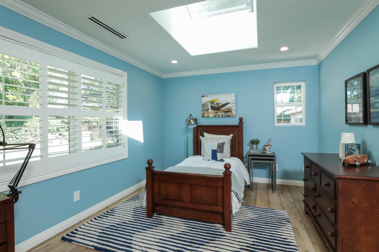 1202 Payne Drive Los Altos, CA 94024 - Photo 20 of 36 a bedroom with a bed and wooden floor