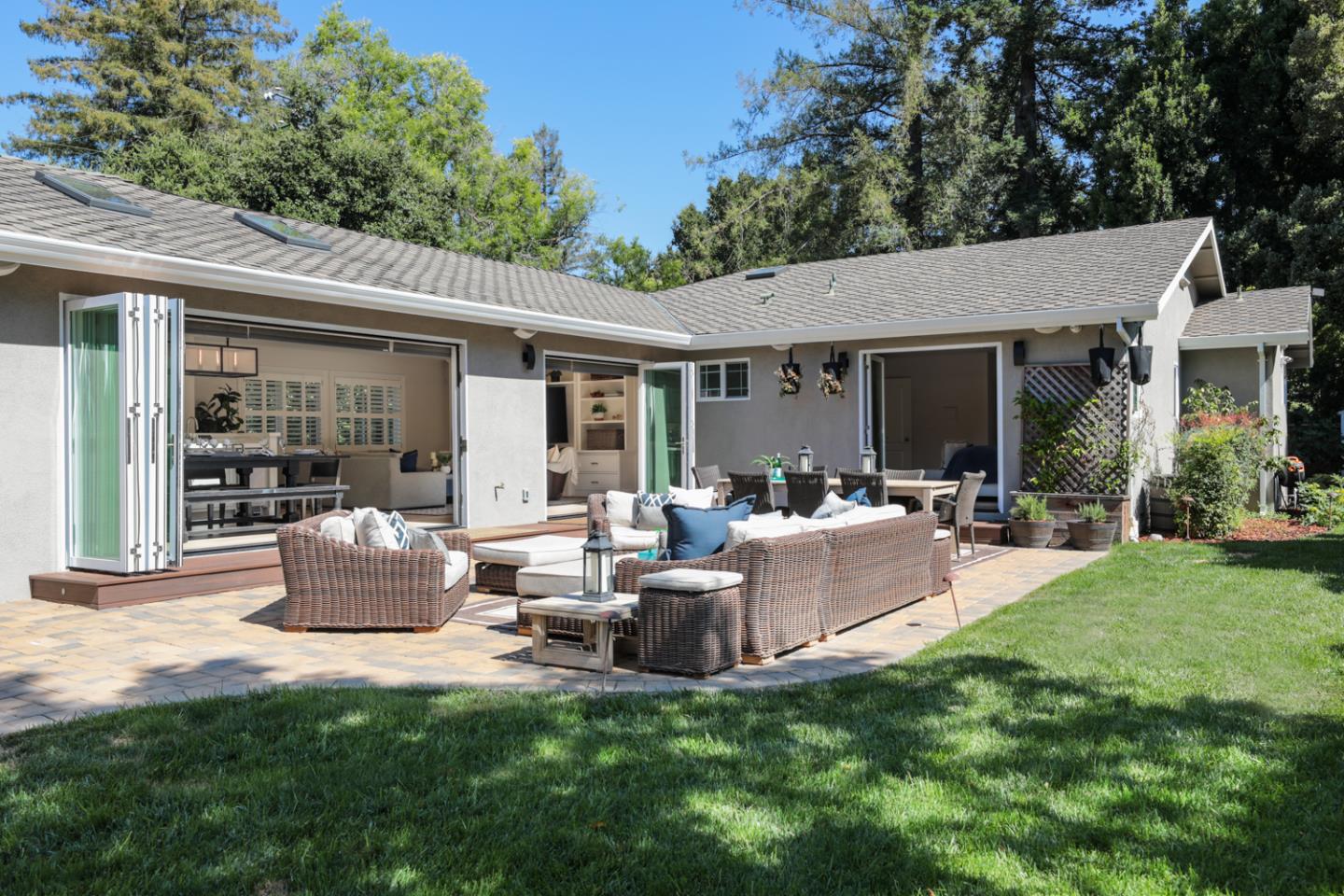 1202 Payne Drive Los Altos, CA 94024 - Photo 27 of 36 a backyard of a house with table and chairs