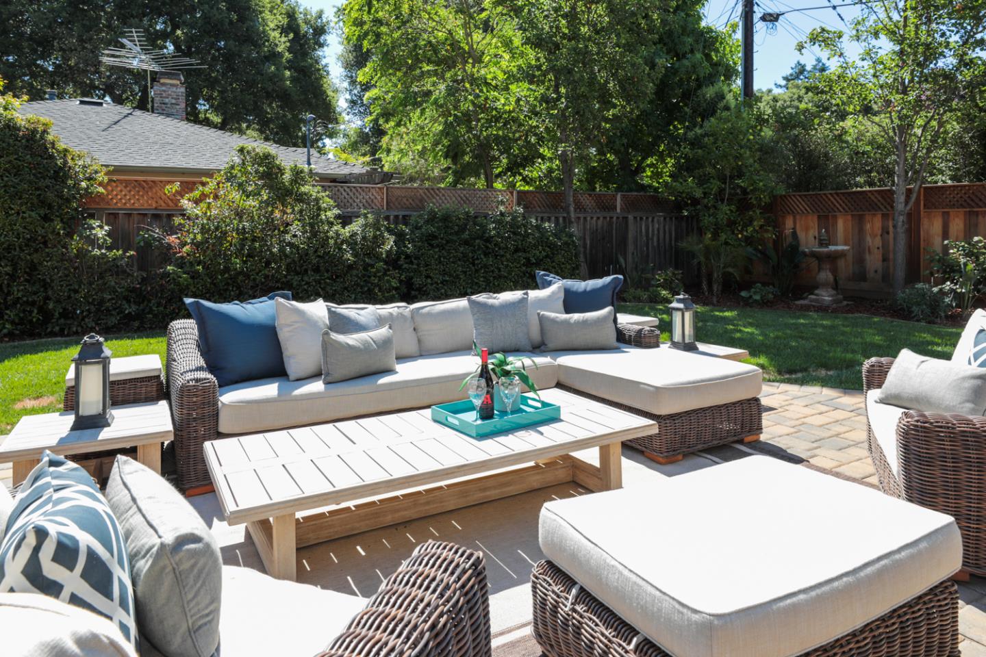 1202 Payne Drive Los Altos, CA 94024 - Photo 29 of 36 a view of a patio with couches chairs and a fire pit