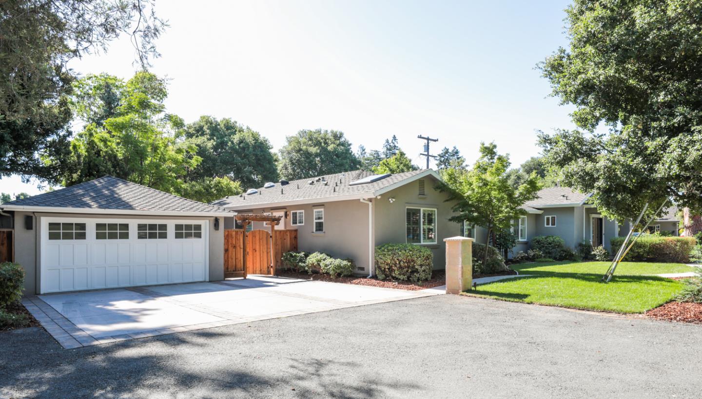 1202 Payne Drive Los Altos, CA 94024 - Photo 34 of 36 a front view of a house with a yard and potted plants