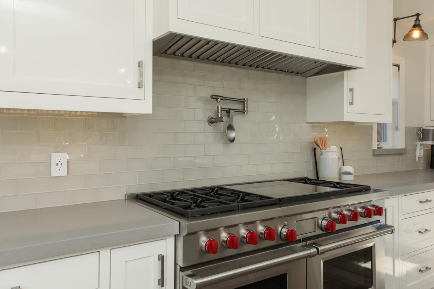 1202 Payne Drive Los Altos, CA 94024 - Photo 9 of 36 a stove top oven sitting inside of a kitchen