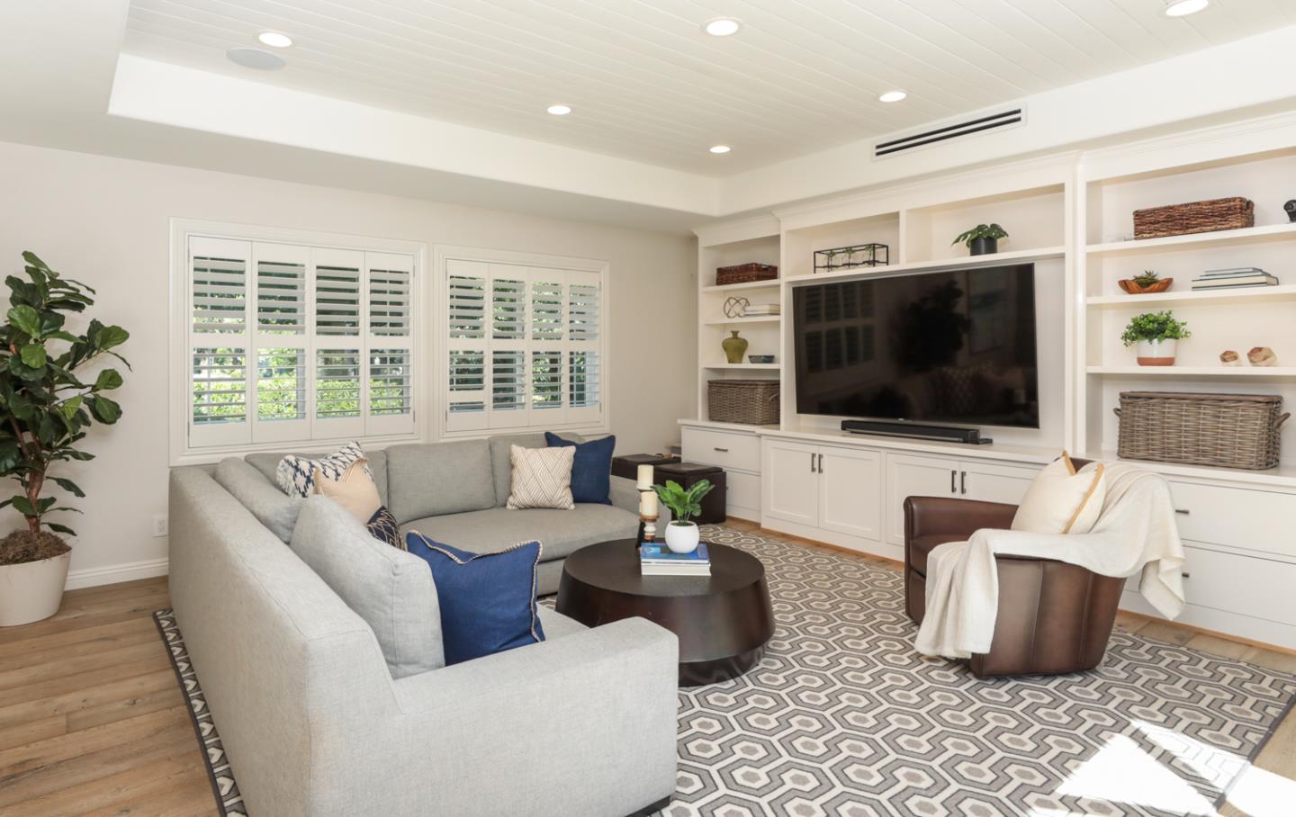 1202 Payne Drive Los Altos, CA 94024 - Photo 10 of 36 a living room with furniture and a flat screen tv