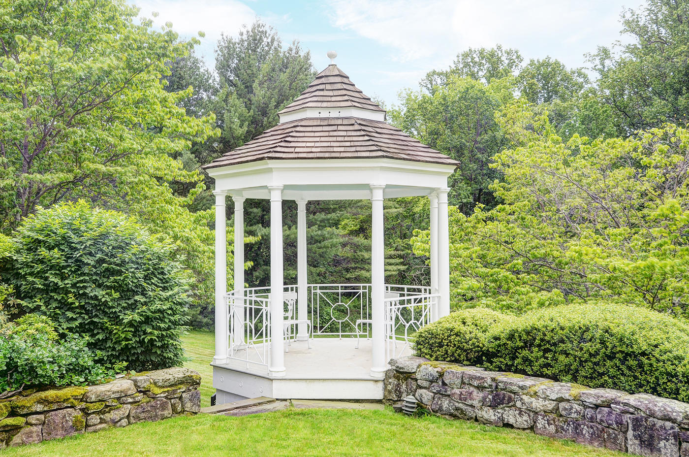 96 Woods End Road New Canaan, CT 06840 - Photo 18 of 21 a view of a house with a yard