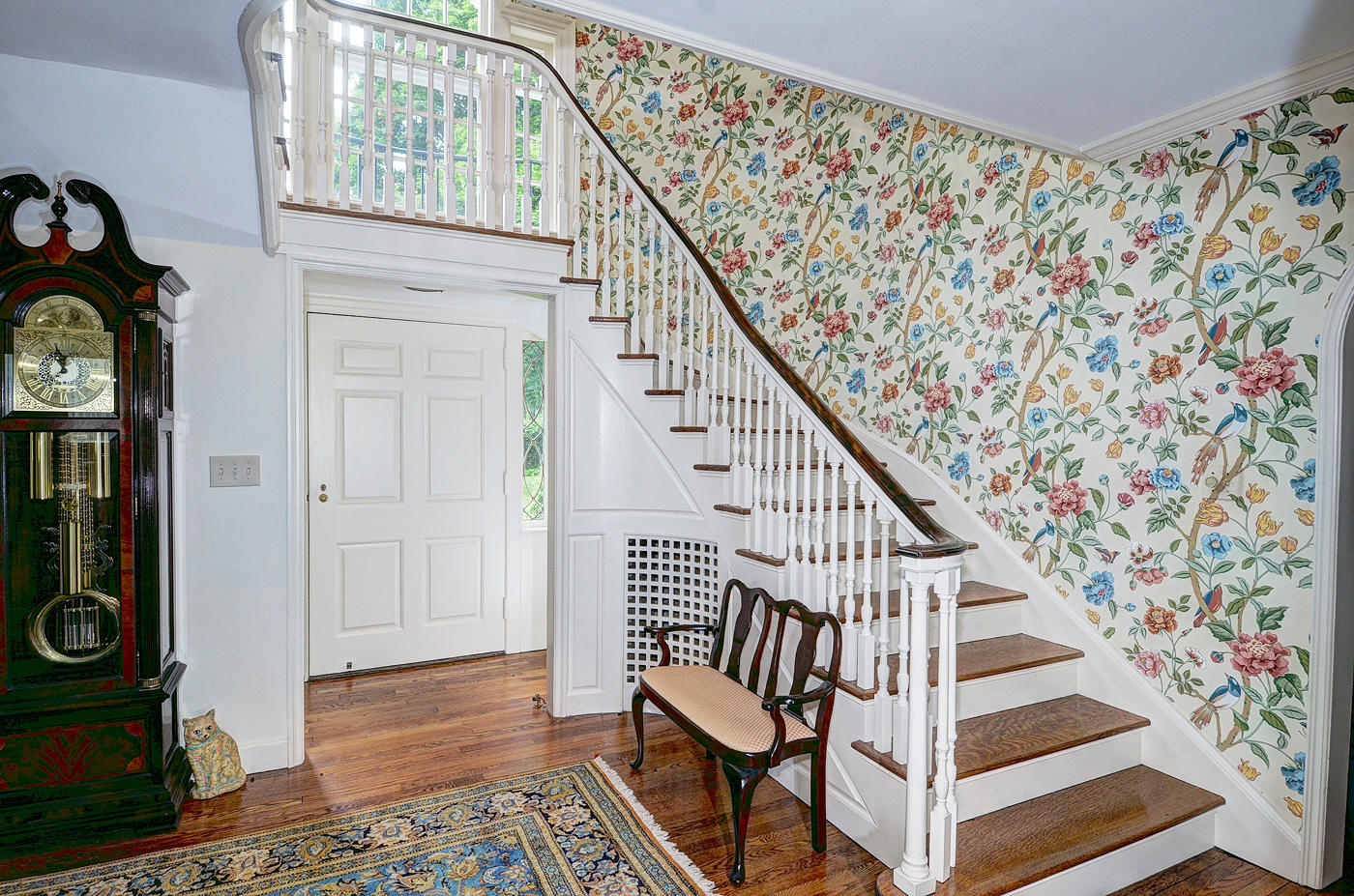 96 Woods End Road New Canaan, CT 06840 - Photo 5 of 21 a view of entryway with wooden floor and stairs