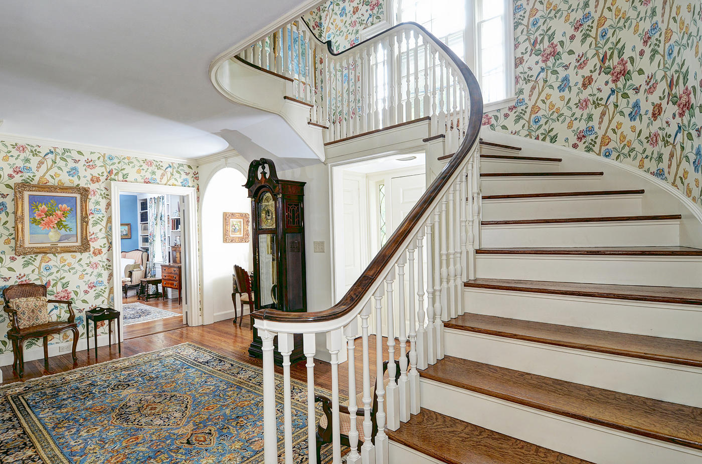 96 Woods End Road New Canaan, CT 06840 - Photo 6 of 21 a view of entryway dining room and hall with wooden floor