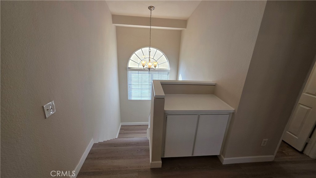 15577 Castellion Road Fontana, CA 92337 - Photo 17 of 38 Staircase from the 2nd floor