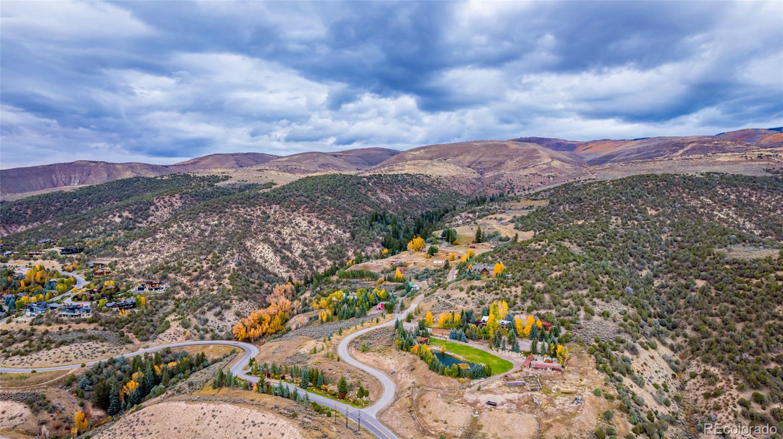 983 Beard Creek Road Edwards, CO 81632 - Photo 15 of 23 a view of a city with mountains in the background