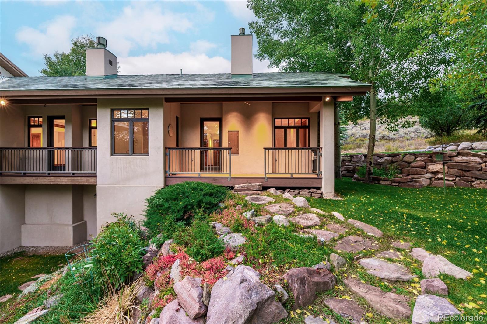 983 Beard Creek Road Edwards, CO 81632 - Photo 20 of 23 a front view of a house with garden