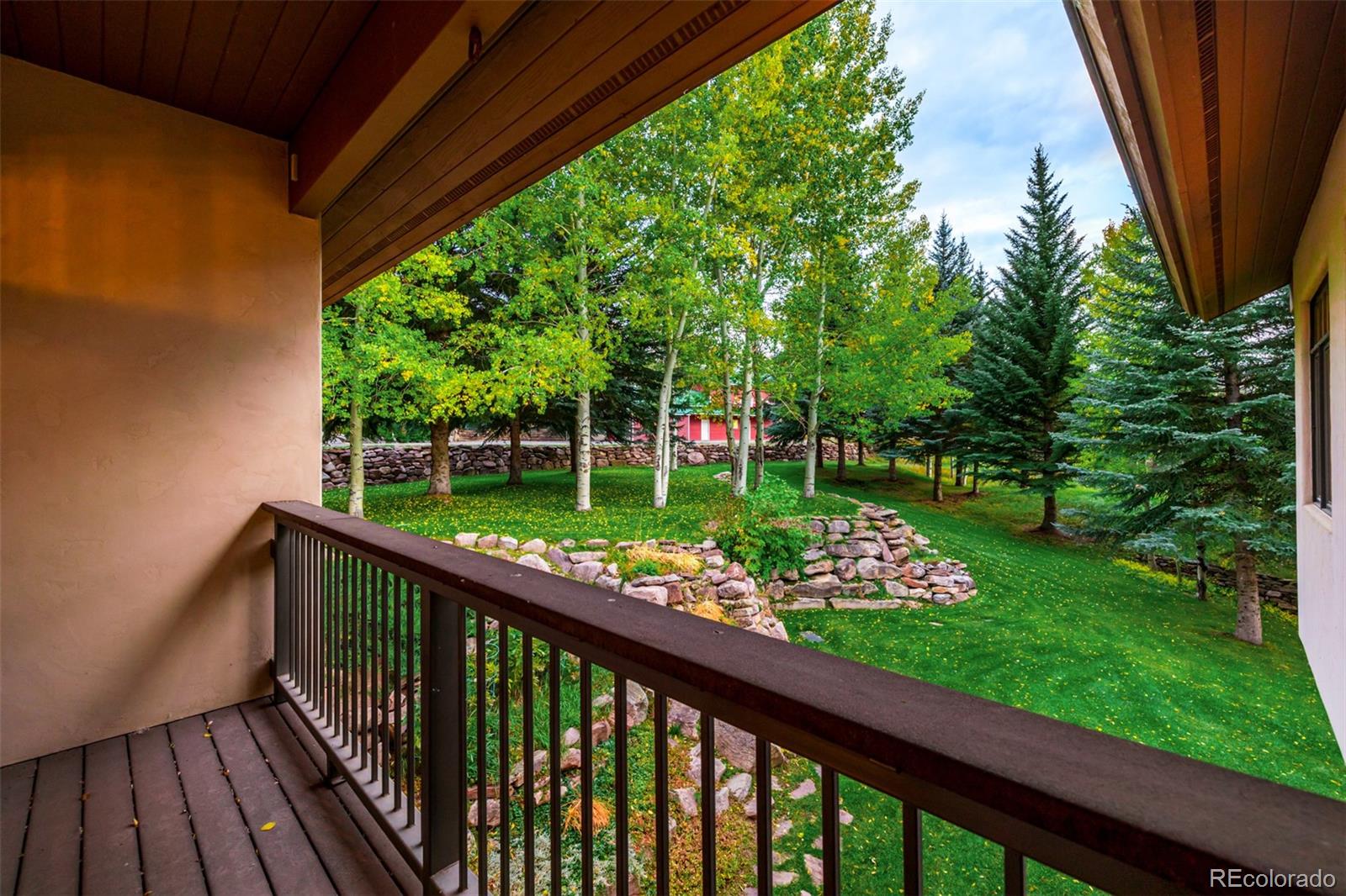 983 Beard Creek Road Edwards, CO 81632 - Photo 23 of 23 a view of a wooden deck with a yard
