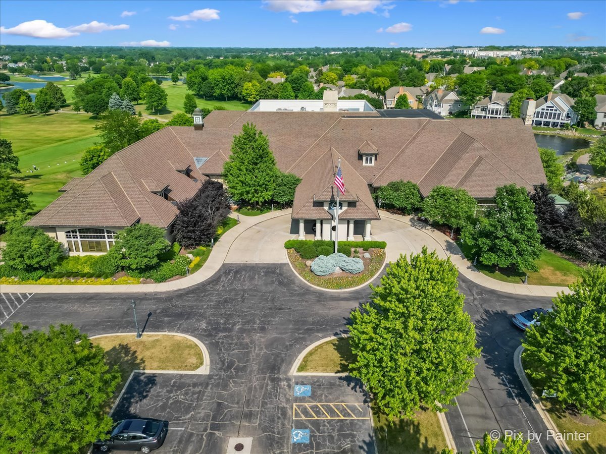 2 Shadow Creek Court Lake In The Hills, IL 60156 - Photo 41 of 44 an aerial view of a house with garden space and a swimming pool