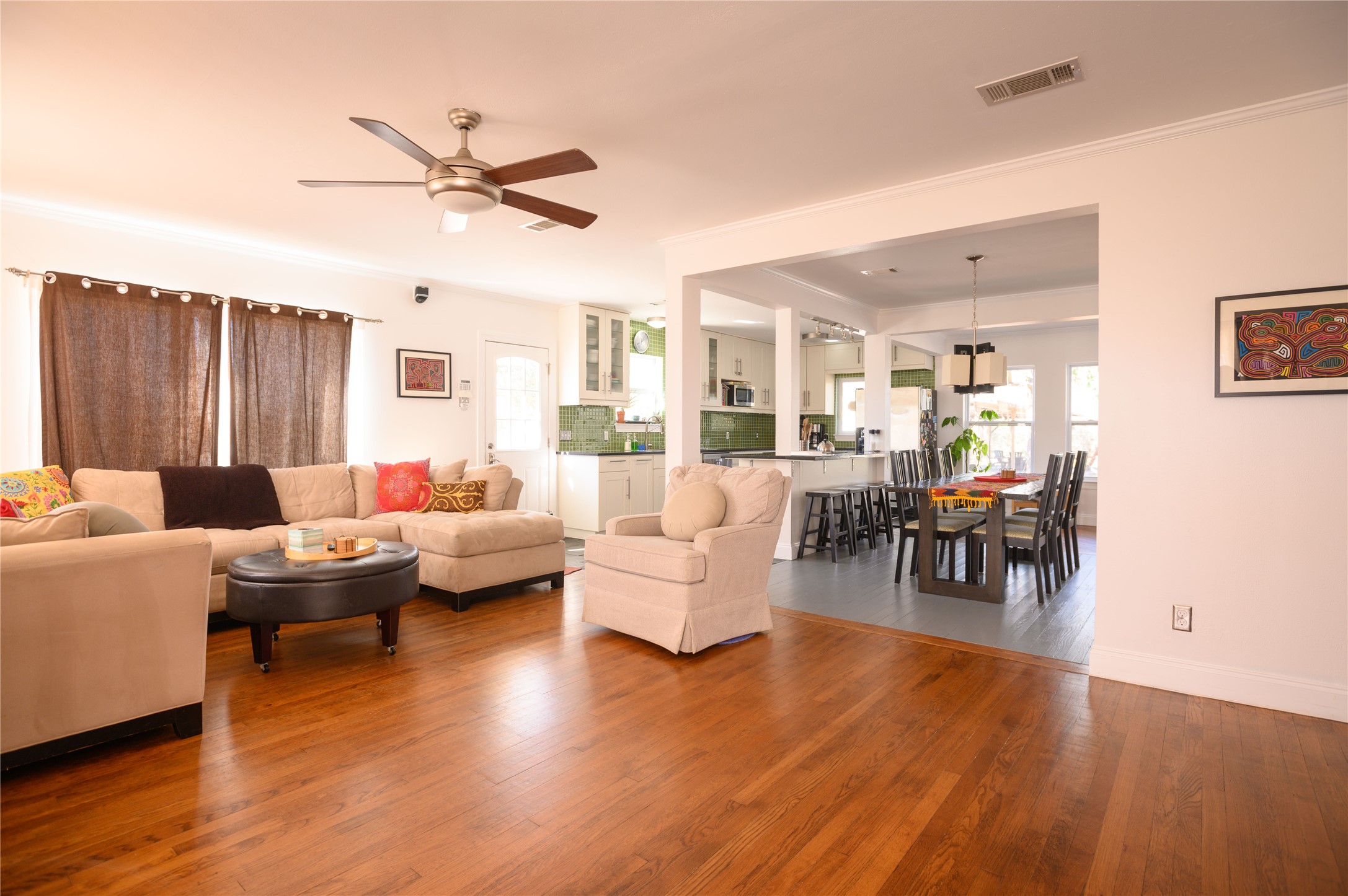 4902 Pecan Springs Road Austin, TX 78723 - Photo 20 of 40 a living room with furniture and a wooden floor