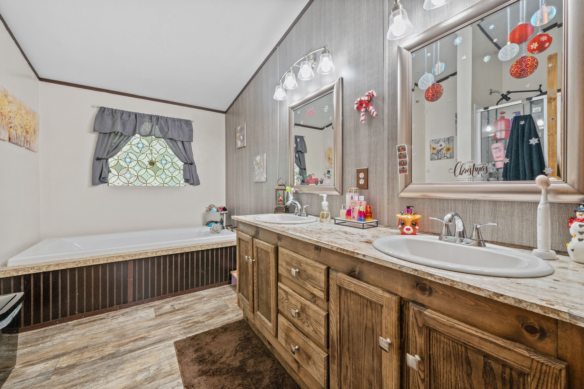 440 River Road Goodrich, TX 77335 - Photo 13 of 18 a bathroom with a double vanity sink mirror and double