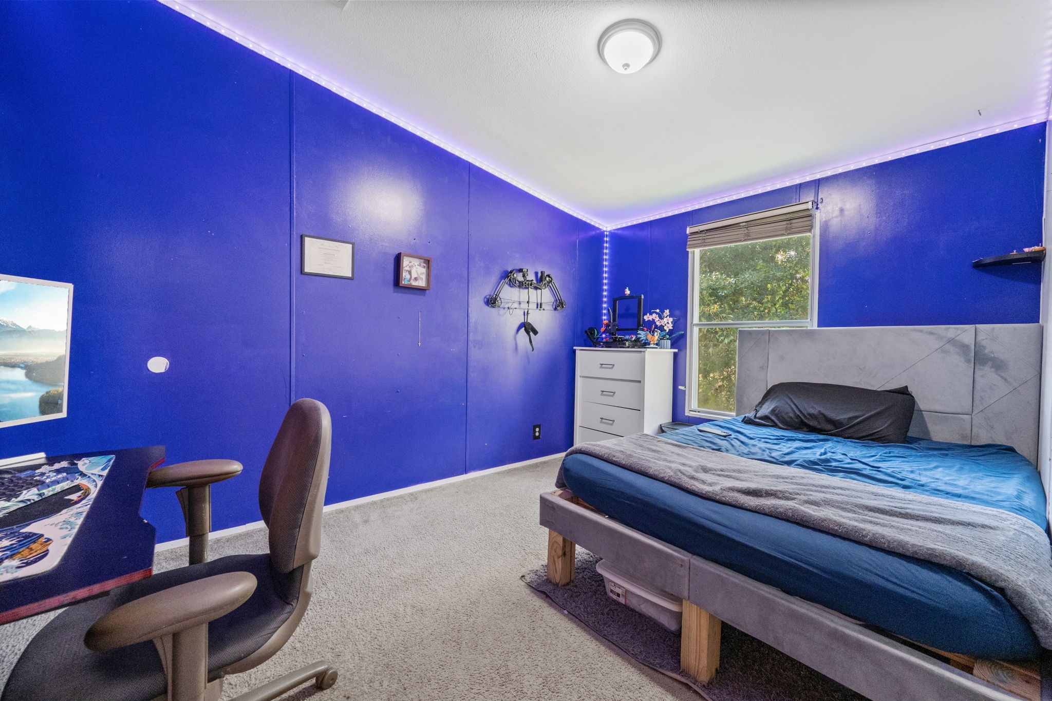440 River Road Goodrich, TX 77335 - Photo 15 of 18 a living room with furniture and a desk