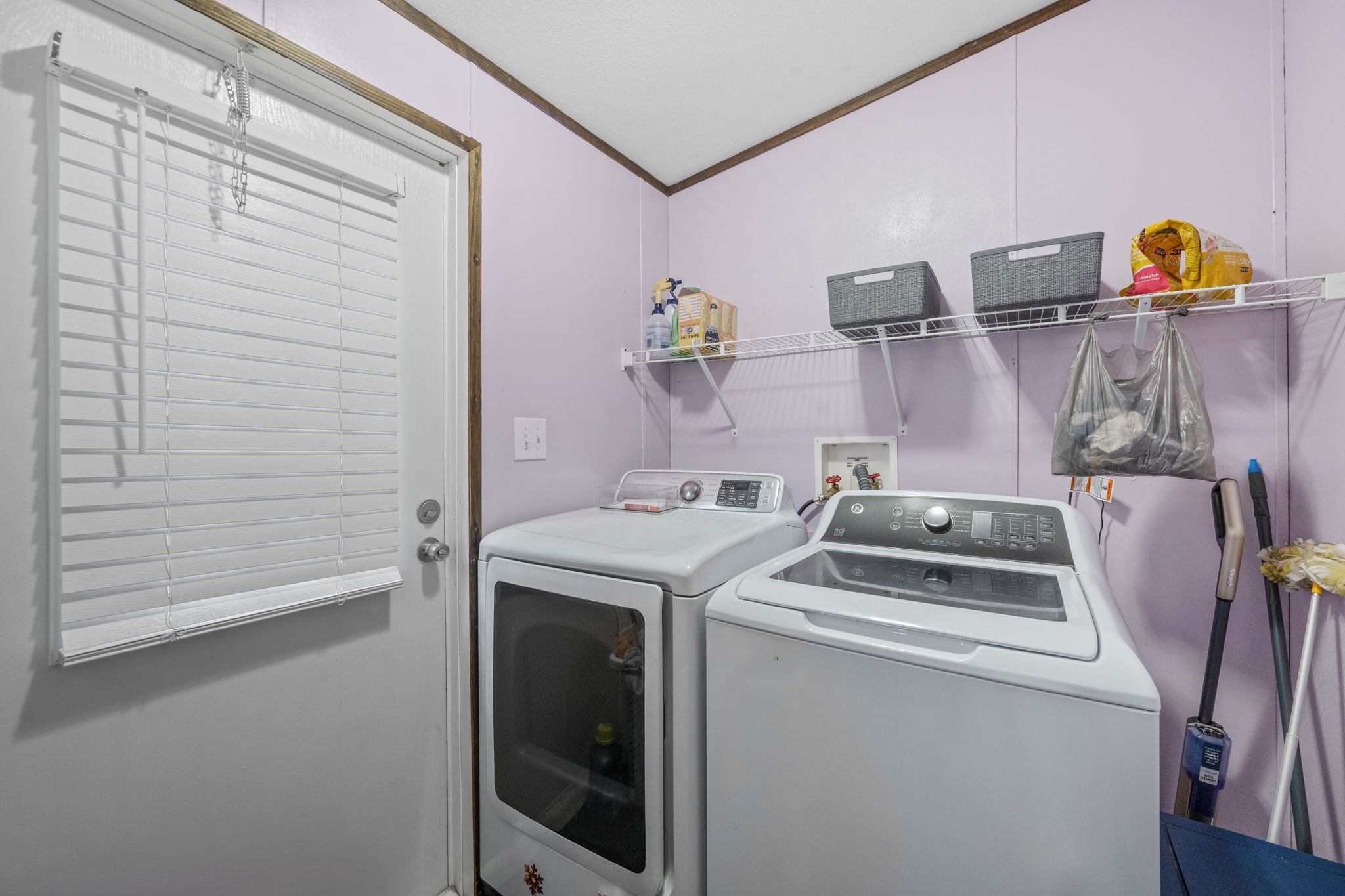 440 River Road Goodrich, TX 77335 - Photo 18 of 18 a utility room with dryer and washer