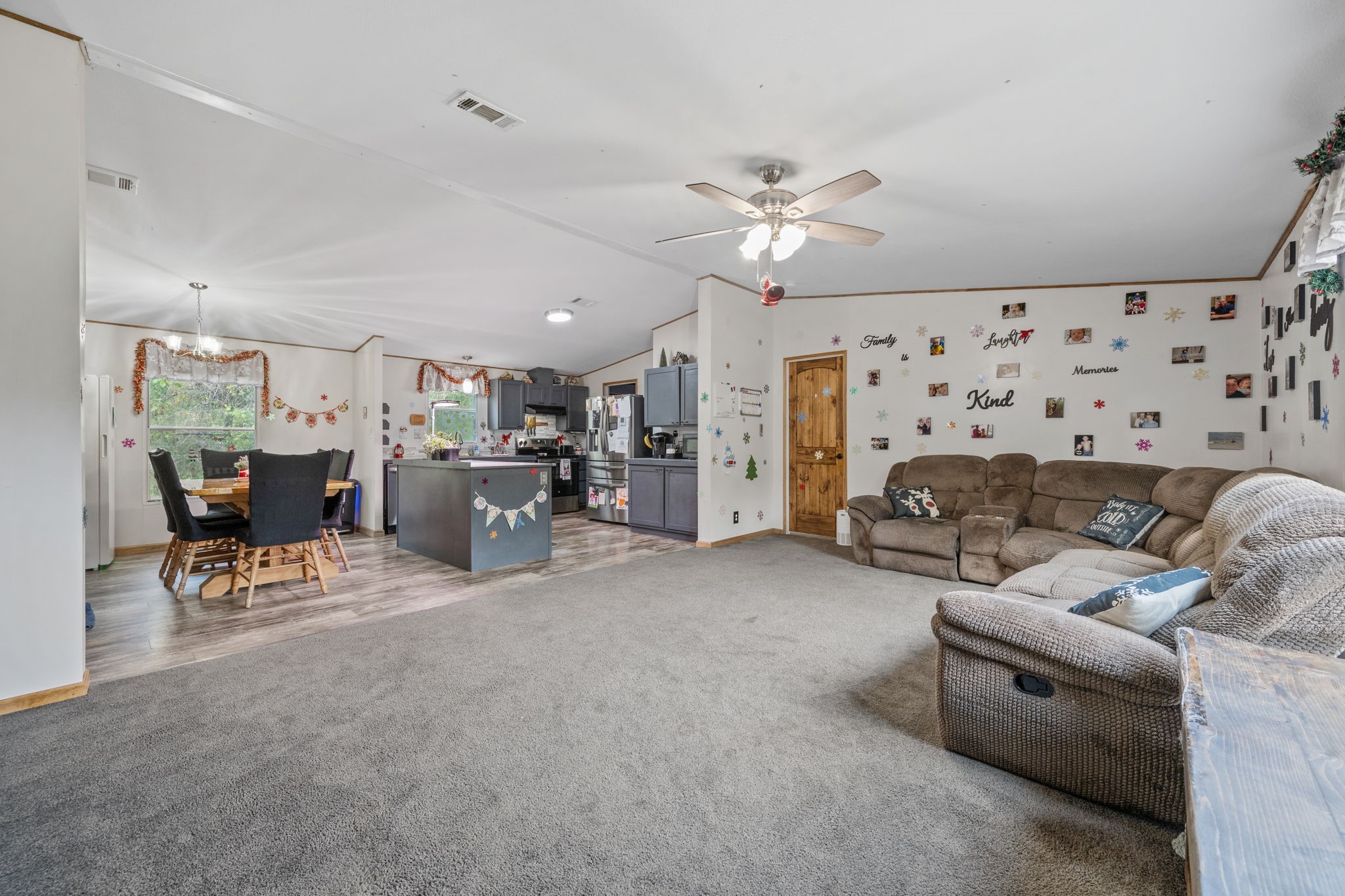 440 River Road Goodrich, TX 77335 - Photo 3 of 18 a living room with furniture and kitchen view