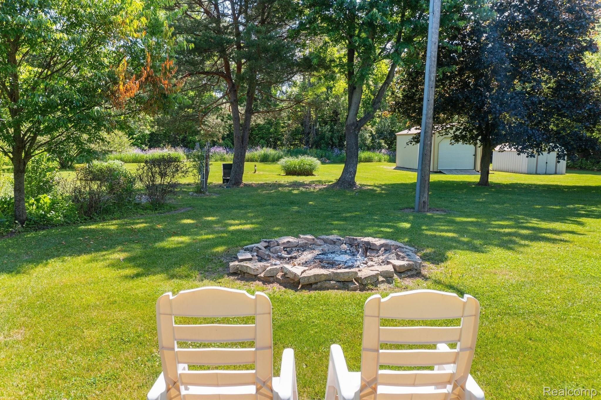 4721 Rochester Road Dryden, MI 48428 - Photo 25 of 33 Bonfire pit.