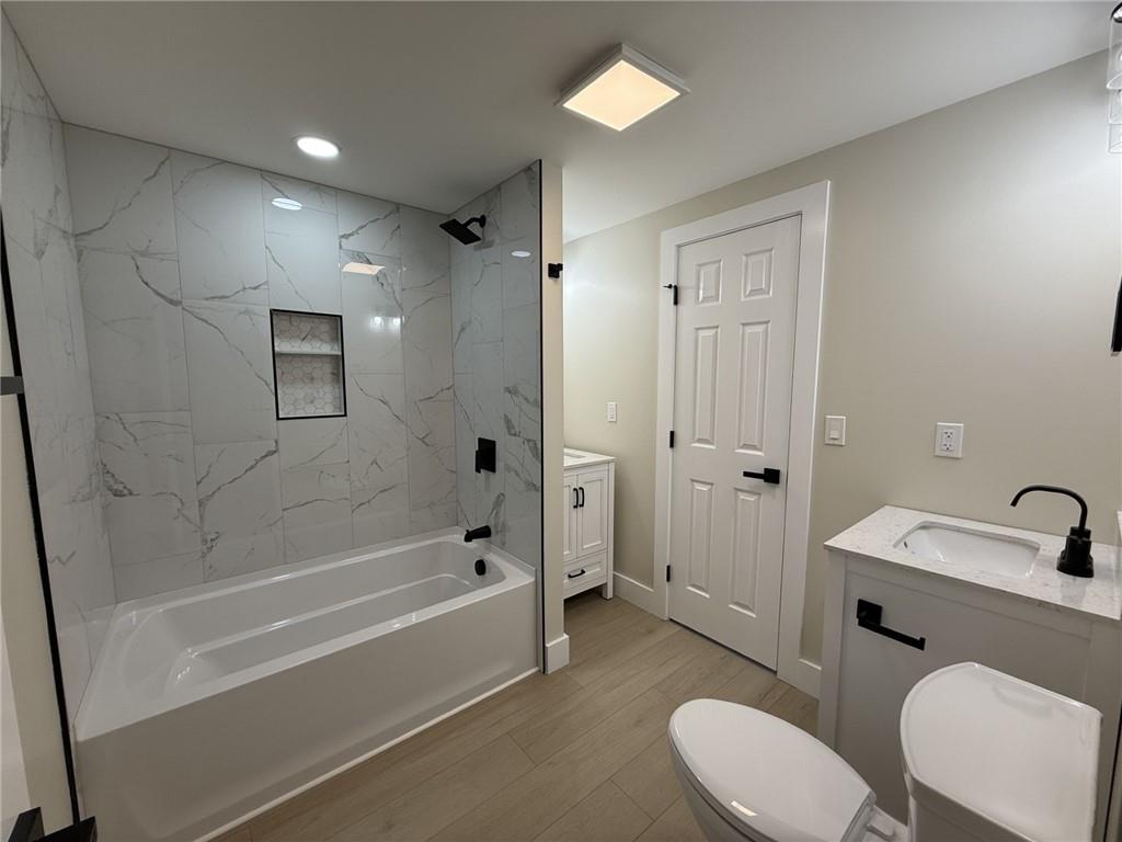 315 Vaneal Road Washington, PA 15301 - Photo 18 of 26 a bath room with a toilet a sink and a bath tub
