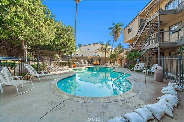 a view of balcony with wooden floor