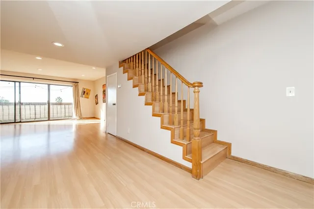 a view of entryway with wooden floor