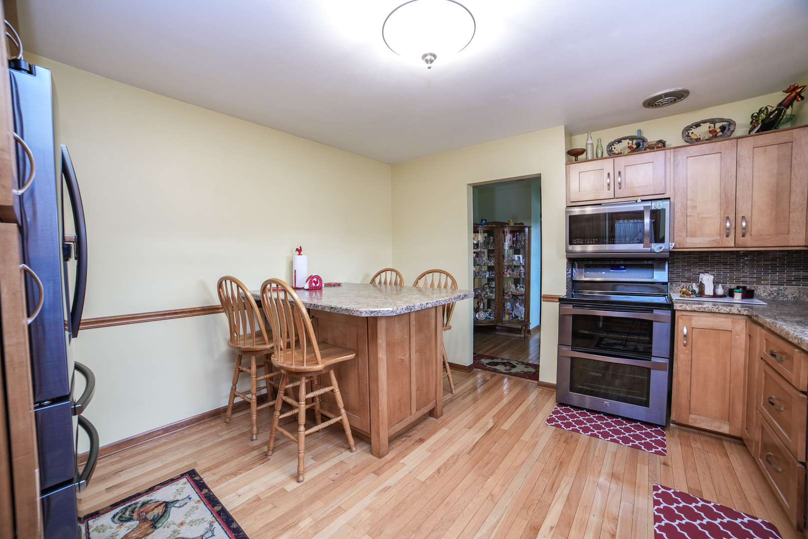 2833 East 1600 North Road Sheldon, IL 60966 - Photo 9 of 70 a dining room with furniture and wooden floor