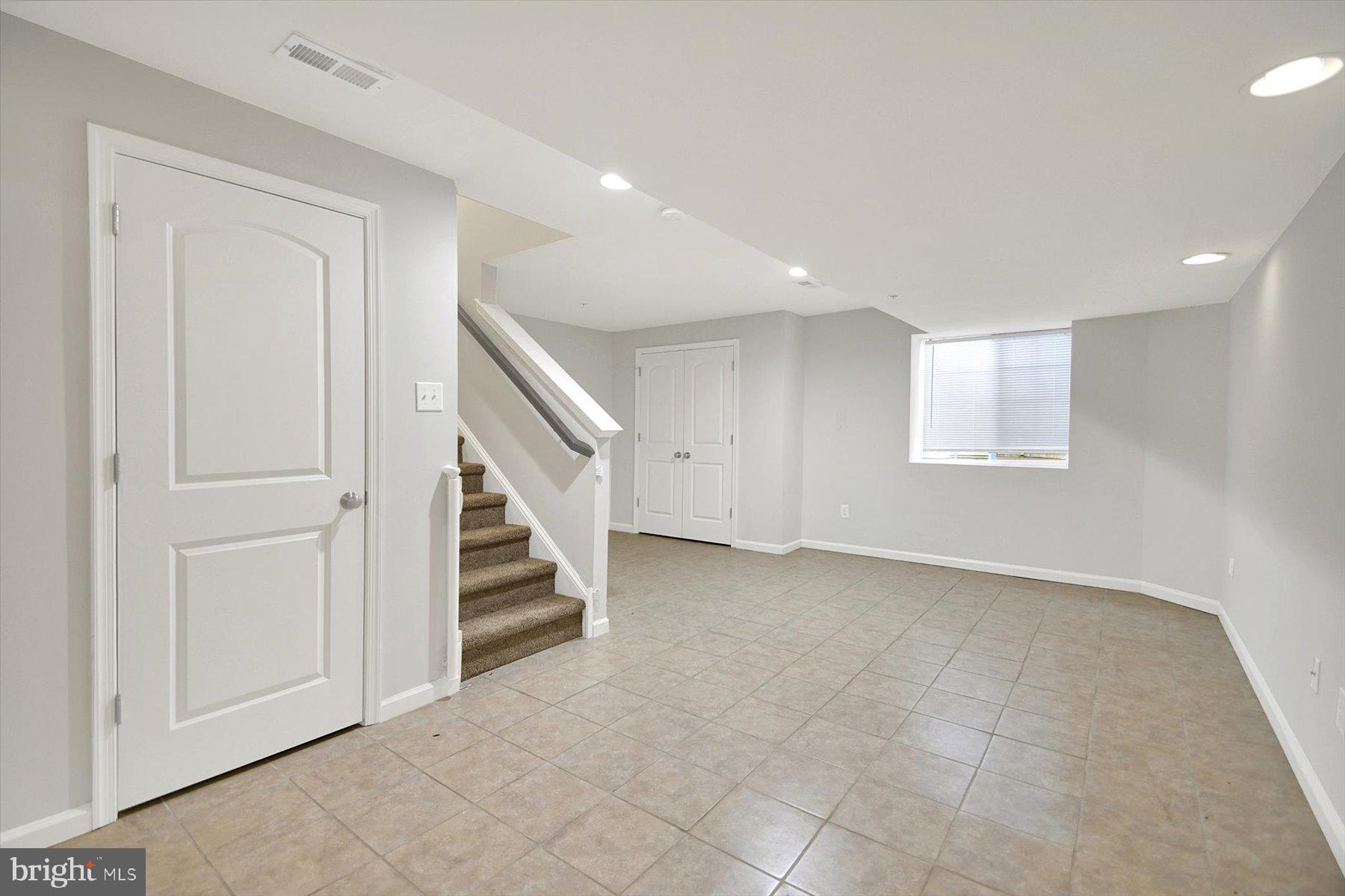 3600 Jacob Stout Road, Unit 3 Doylestown, PA 18902 - Photo 18 of 33 a view of an empty room with stairs