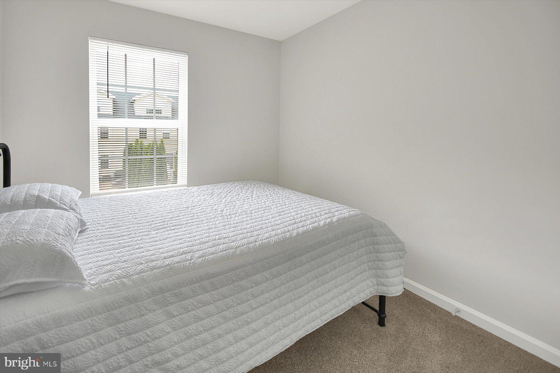 3600 Jacob Stout Road, Unit 3 Doylestown, PA 18902 - Photo 30 of 33 a bedroom with a bed and a window