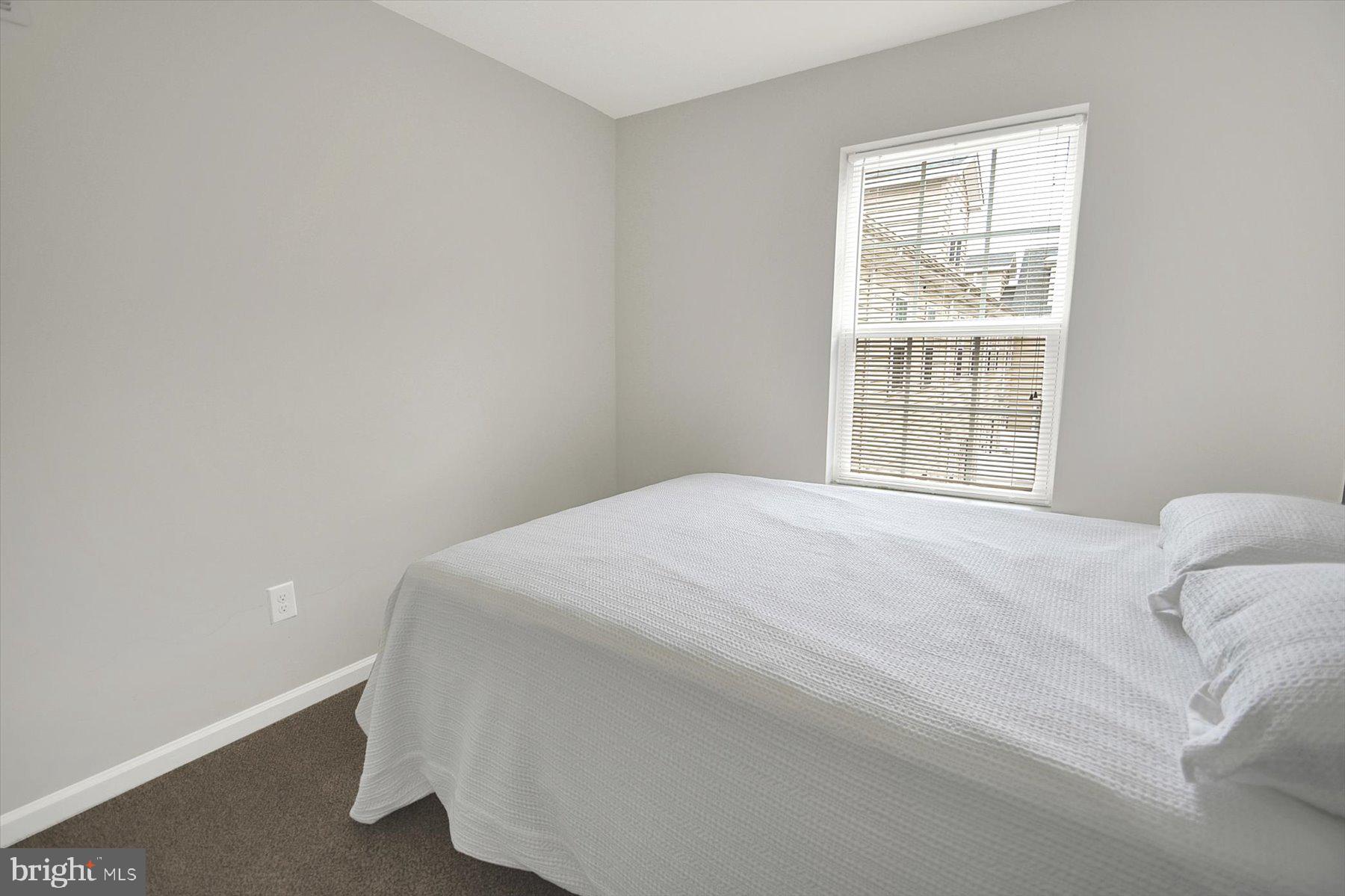 3600 Jacob Stout Road, Unit 3 Doylestown, PA 18902 - Photo 32 of 33 a bedroom with a bed and a window