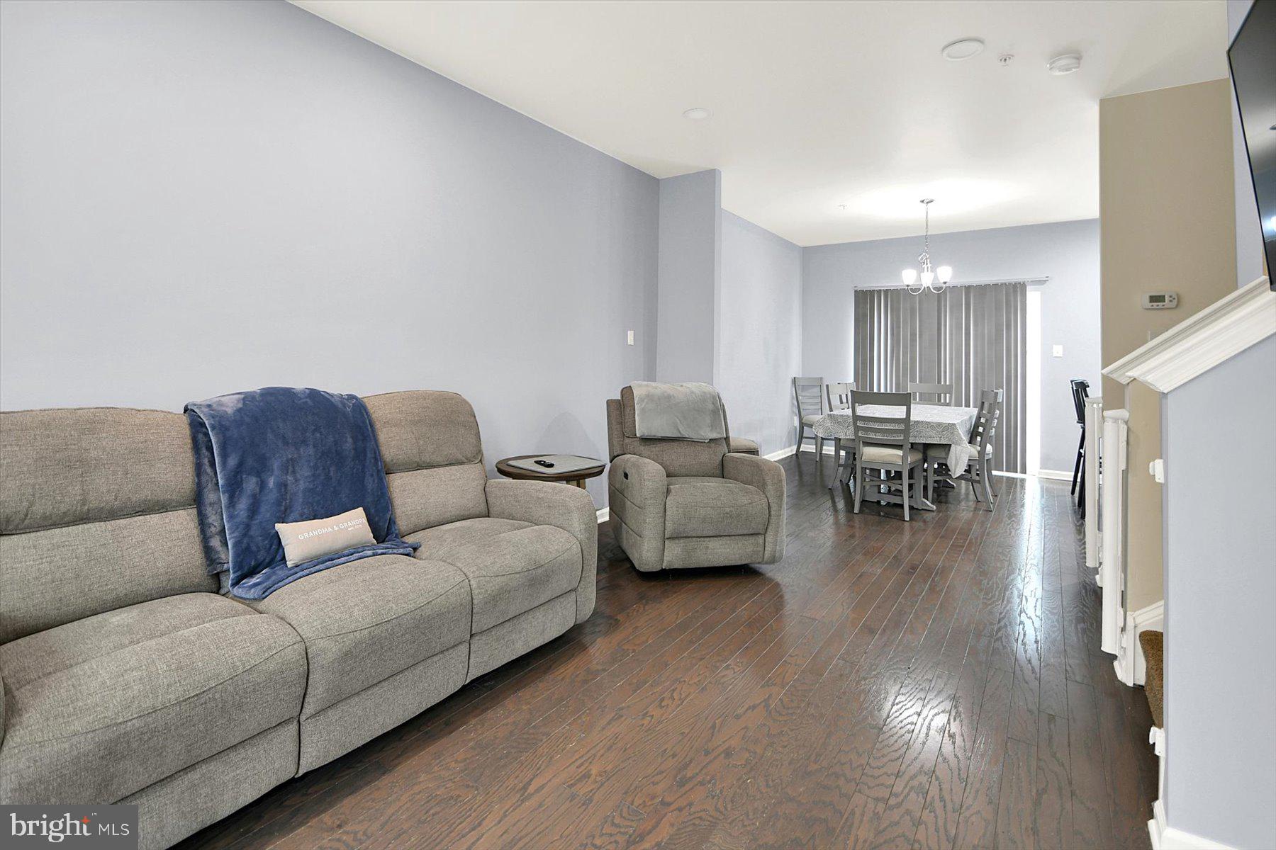 3600 Jacob Stout Road, Unit 3 Doylestown, PA 18902 - Photo 6 of 33 a living room with furniture and a wooden floor