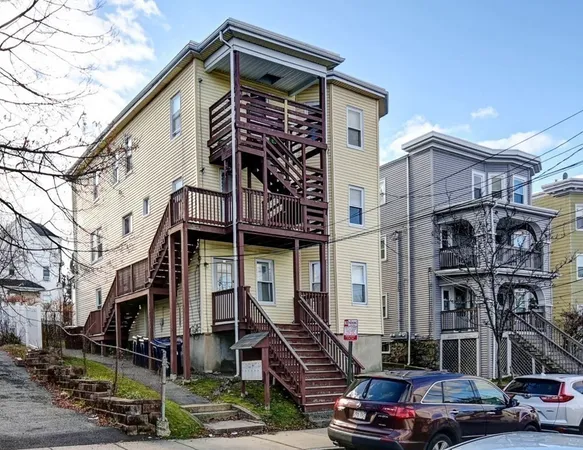 a front view of a building with street view