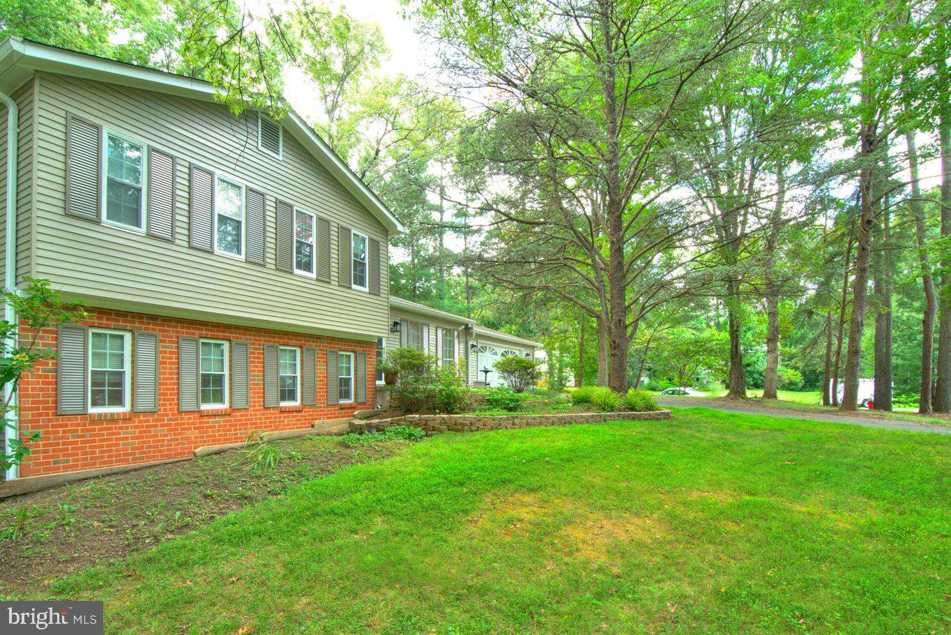 Charming home nestled in lush greenery.