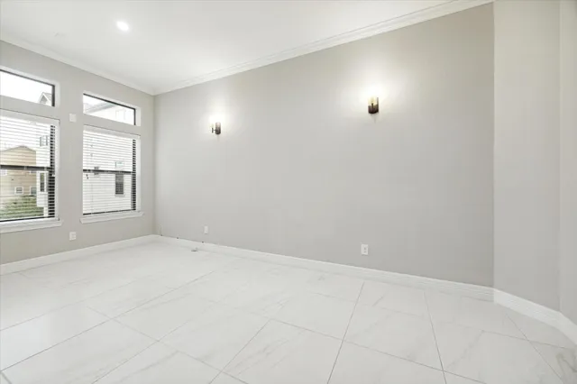 an empty room with windows