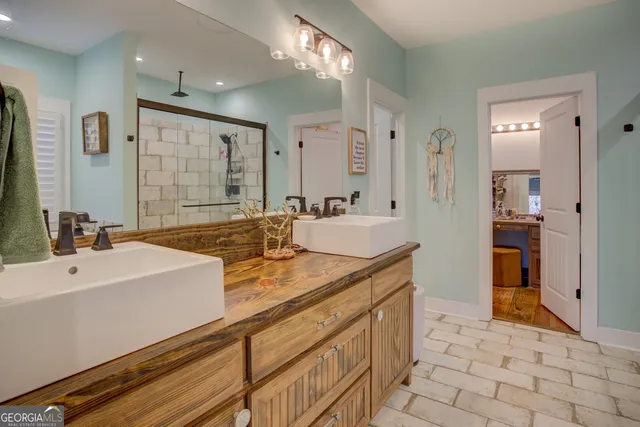 a view of a livingroom with furniture and staircase