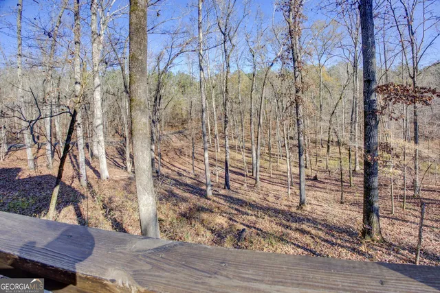 a chair and table sitting in front of a building