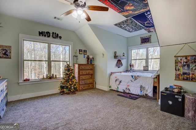 a backyard of a house with lots of green space