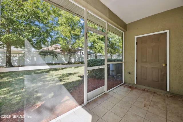 a view of a yard in front of the house
