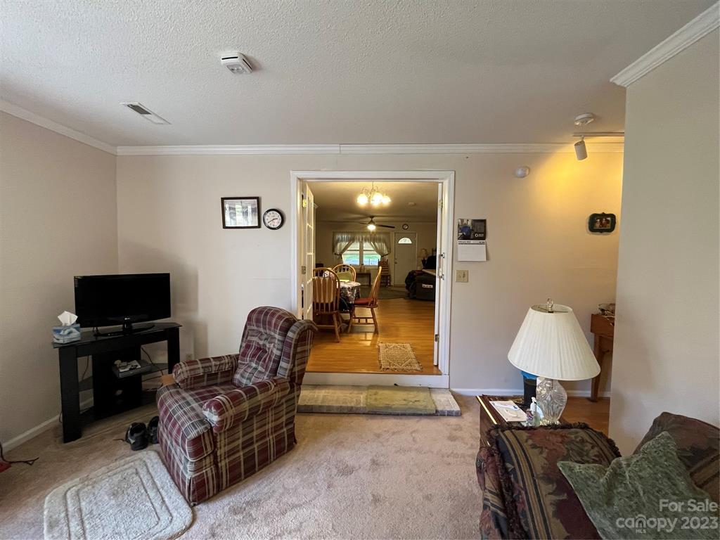 120 Barlow Lane Salisbury, NC 28147 - Photo 14 of 34 a living room with furniture and a flat screen tv