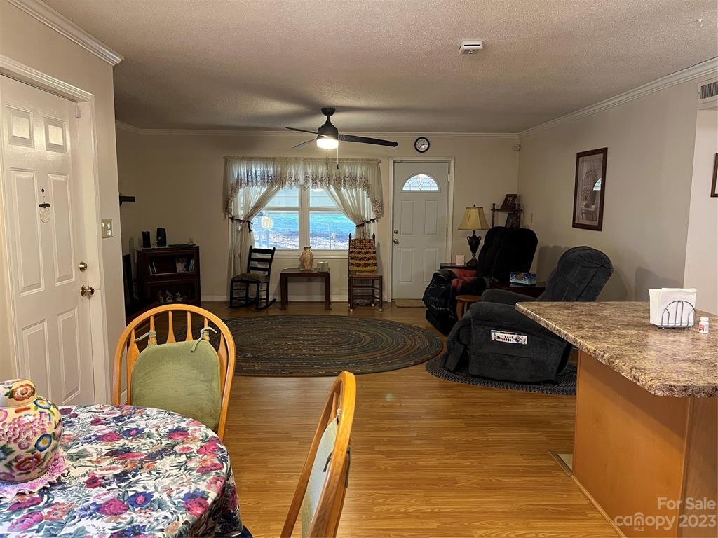 120 Barlow Lane Salisbury, NC 28147 - Photo 15 of 34 a bedroom with double bed and a chandelier