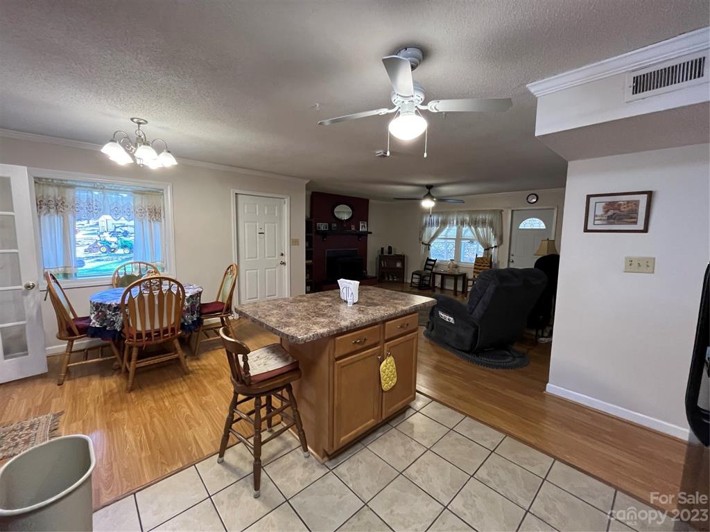 120 Barlow Lane Salisbury, NC 28147 - Photo 17 of 34 a view of a dining room with furniture and chandelier