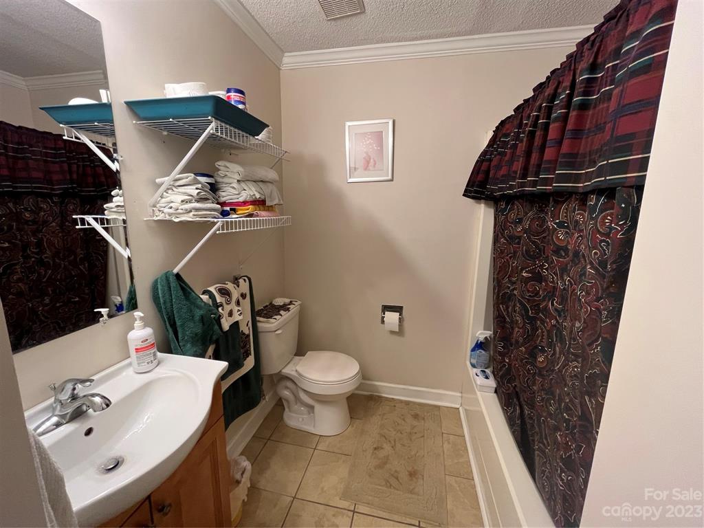 120 Barlow Lane Salisbury, NC 28147 - Photo 27 of 34 a bathroom with a sink toilet and a shower