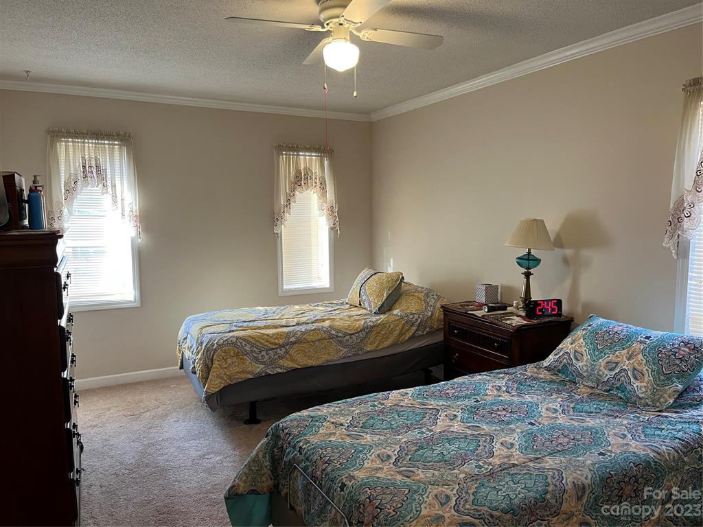 120 Barlow Lane Salisbury, NC 28147 - Photo 31 of 34 a bedroom with two bed and window