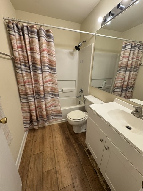 220 Elm Street, Unit 502 Clemson, SC 29631 - Photo 13 of 20 This bathroom features warm wood-look flooring and a functional bath and shower combination.