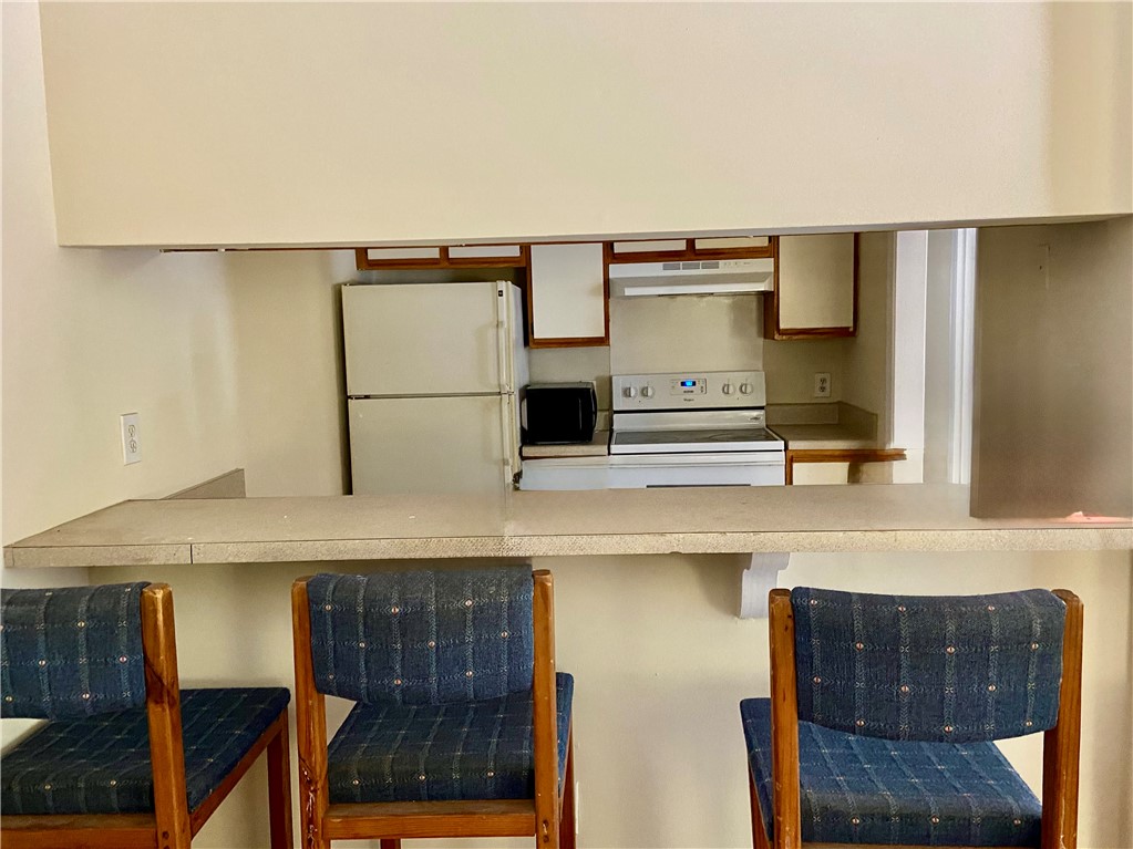 220 Elm Street, Unit 502 Clemson, SC 29631 - Photo 6 of 17 This kitchen offers a practical layout with a new refrigerator.