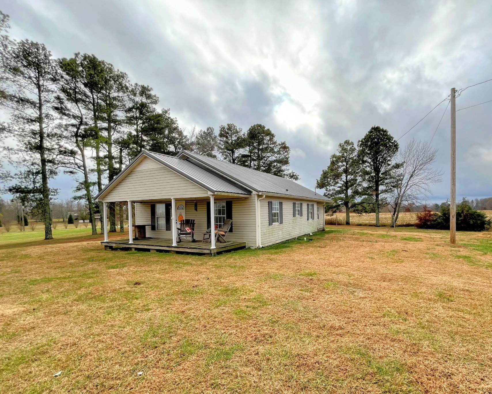 301 Rabbit Trail Road Leoma, TN 38468 - Photo 2 of 33 a view of a house with a yard and large trees